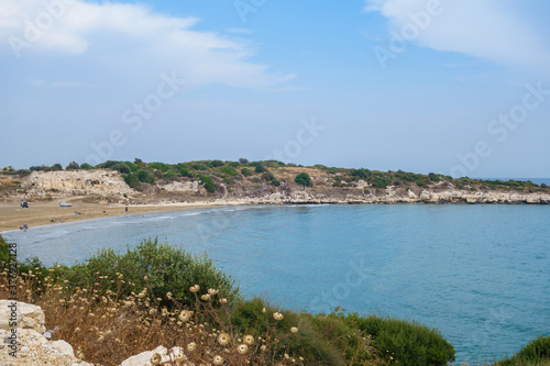 Wallpaper Mural Coastline of Mediterranean sea near Kizkalesi, Turkey. Local people relaxing on beach (left side). Remains of ancient city Elaiussa Sebaste are on background. It was founded by Byzantines Torontodigital.ca