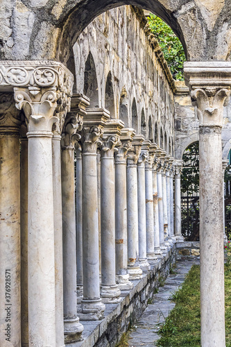 12th century Ruins of old cloisters standing in a small garden in Genoa, Italy.