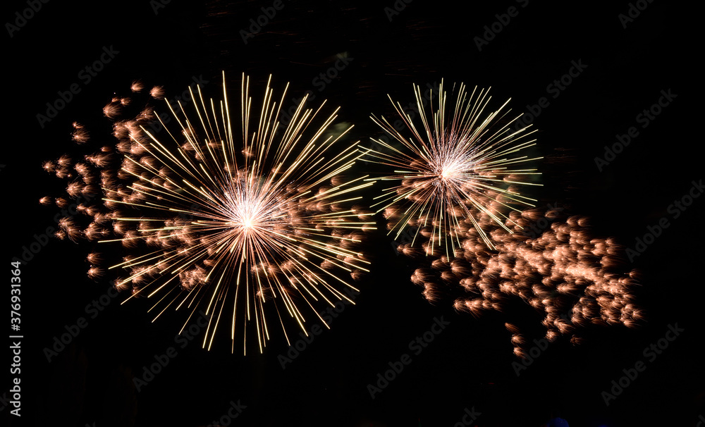 Festive fireworks.Bright rockets in the evening sky Festive fireworks.Bright rockets in the evening sky