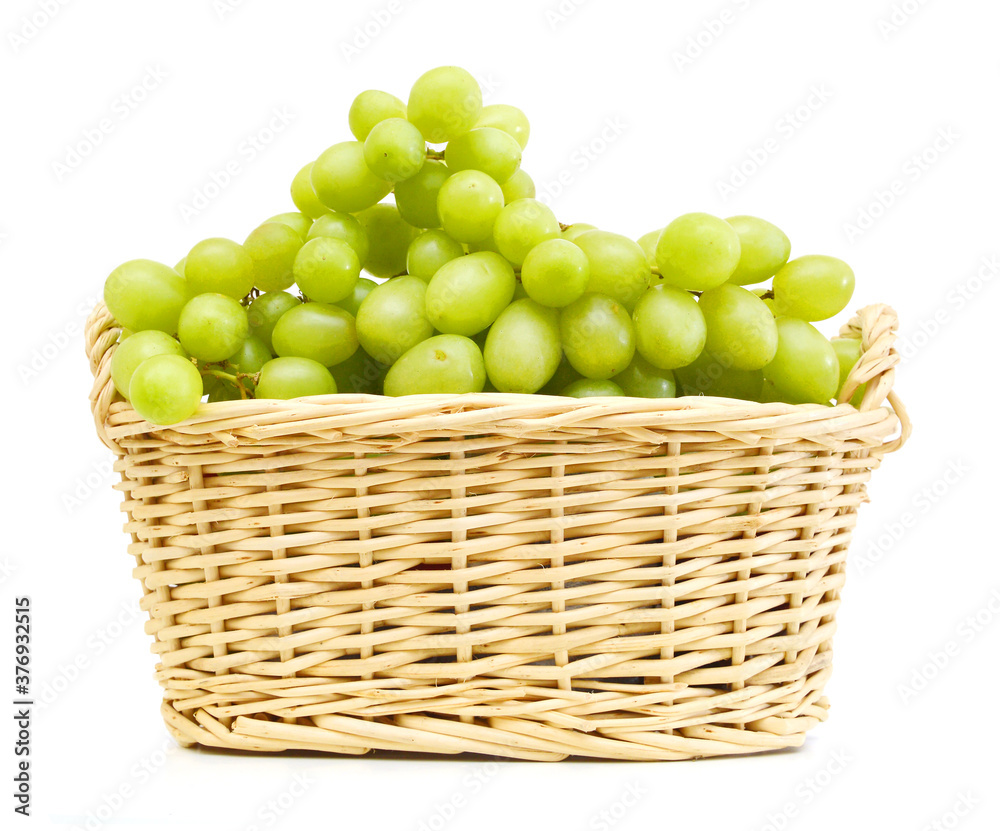 Green Grapes in basket isolated on a white background Green Grapes in basket isolated on a white background