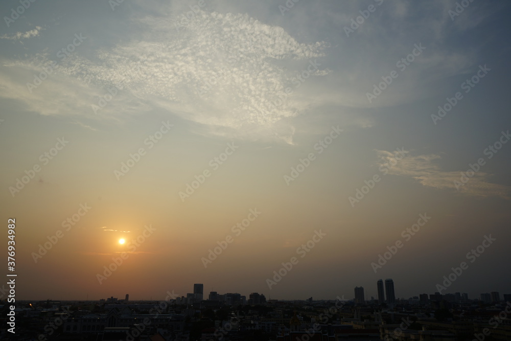 sunset over in Bangkok Thailand or view top of Wat Saket Temple