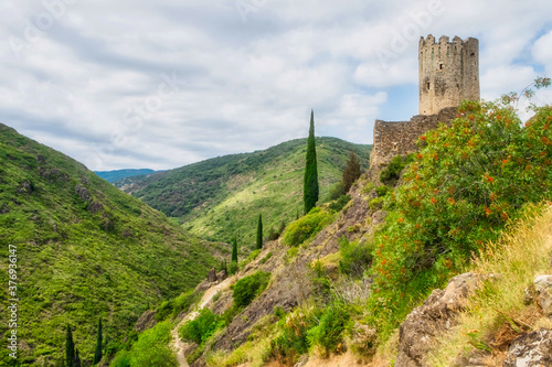 Ruins of four medieval cathar castles Lastours in the mountain valley of Pyrenees, France