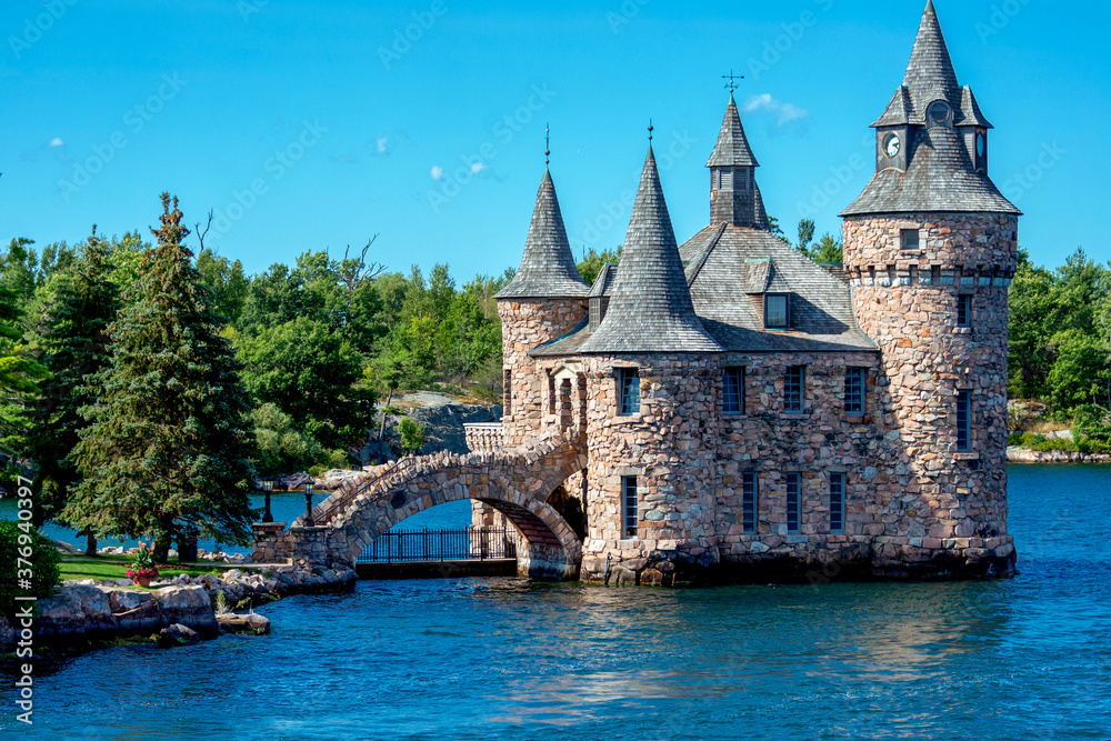 Castle with a bridge on the water near the island