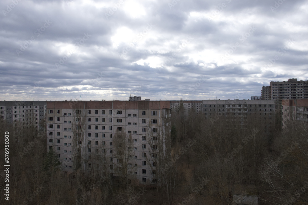 Cloudy sky over abandoned residential buildings in Pripyat.