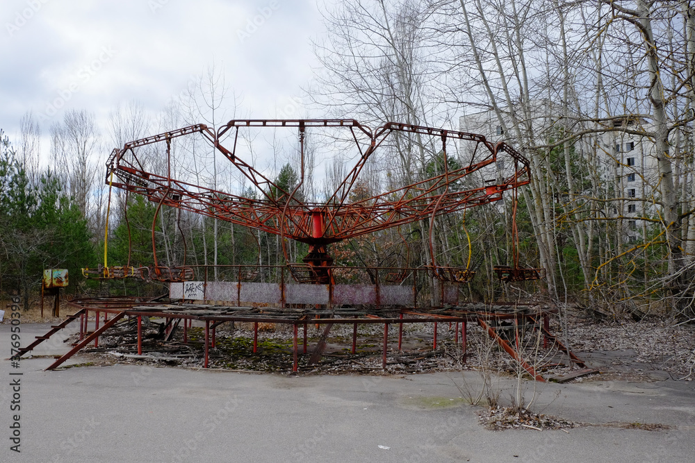 An old broken carousel in the abandoned city of Pripyat. Abandoned amusement park. An old broken carousel in the abandoned city of Pripyat. Abandoned amusement park.