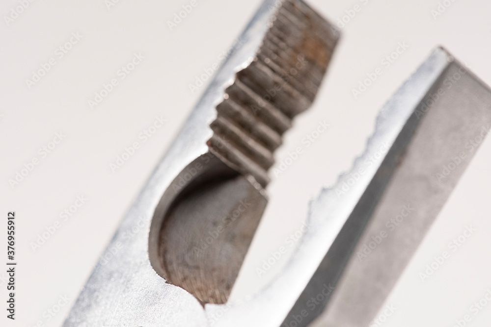 Single combination pliers isolated on white background