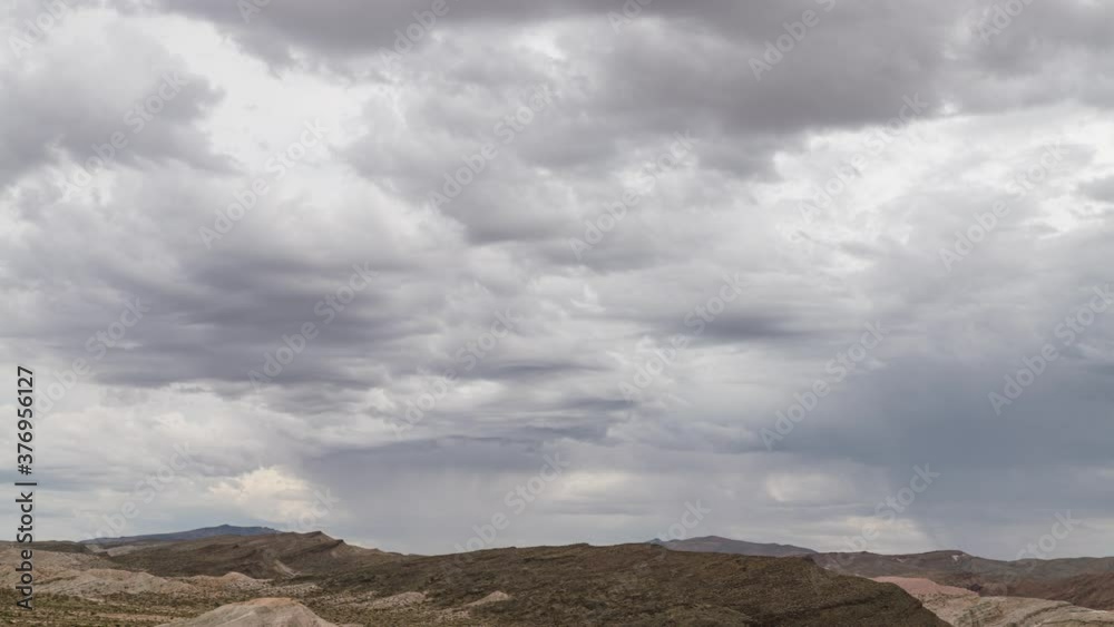 Time lapse of stormy sky over desert landscape in Mojave Desert, California Time lapse of stormy sky over desert landscape in Mojave Desert, California