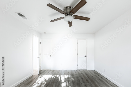 Empty bedroom with doors leading to the livingroom  bathroom and a closet