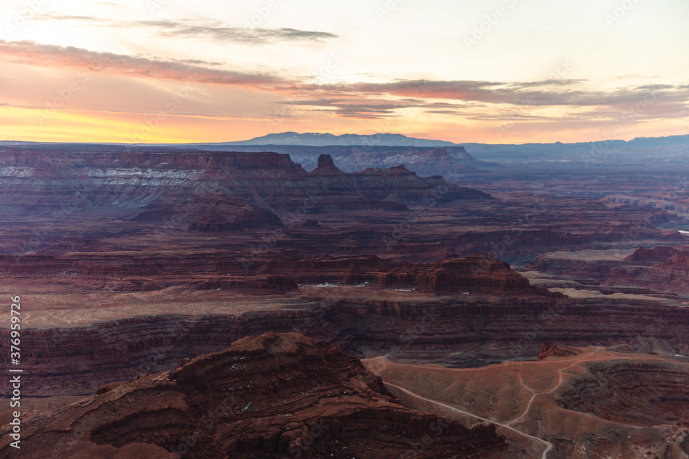 view of the valley in the red rocks desert on a sunrise view of the valley in the red rocks desert on a sunrise