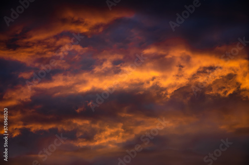 Beautiful cloudscape with sunray bright color blue and red © Алексей Ковалев