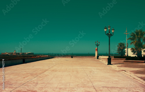 Empty esplanade by the sea
