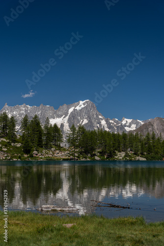 Foto Morgex (Aosta), the wonderful Lake of Arpy, a mirror of water of glacial origin set in a beautiful alpine setting