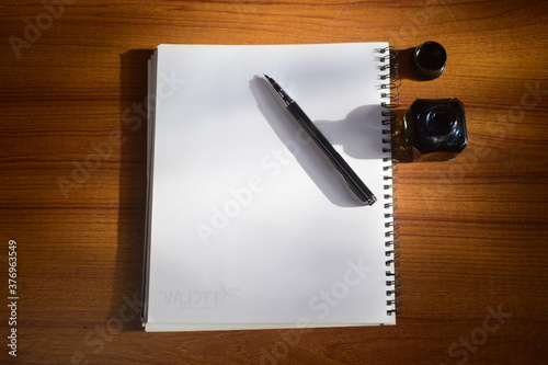 notebook pen and ink