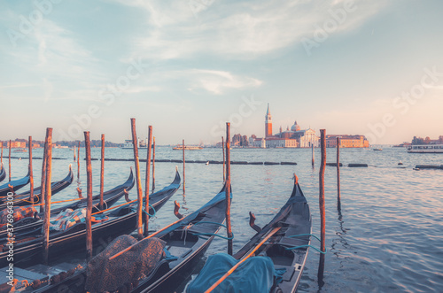 Gondolas on Grand Canal and San Giorgio Maggiore church in Venice © Iakov Kalinin