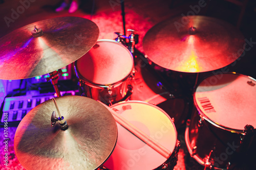Photography Drum Set with some cymbals on stage before a live Concert.