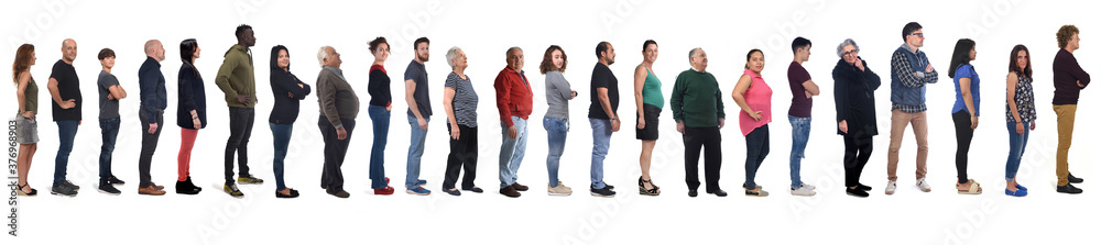 large group of mixed people on white background, side view,