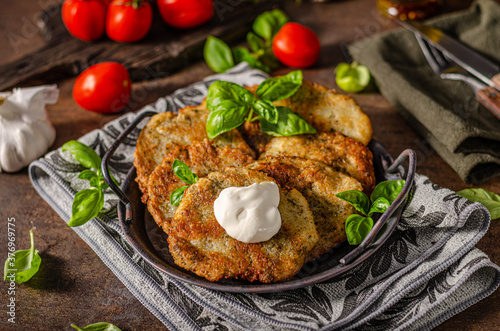 Bild auf Leinwand Potato pancakes with garlic and herbs