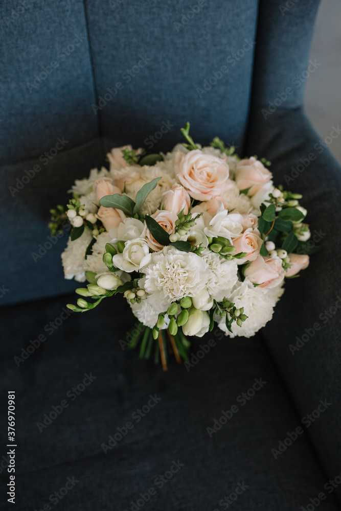 The original bouquet of flowers in the hands of women The original bouquet of flowers in the hands of women