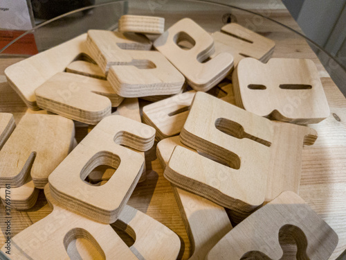 wooden figures on a plastic box shop