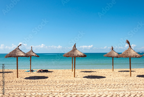 Palma beach with umbrellas and without hammocks