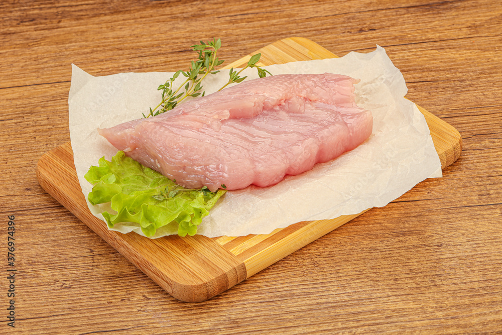 Raw turkey breast steak for cooking