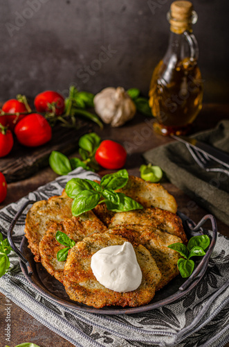 Potato pancakes with garlic and herbs