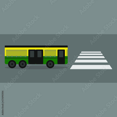 Bus on the road before a pedestrian crossing