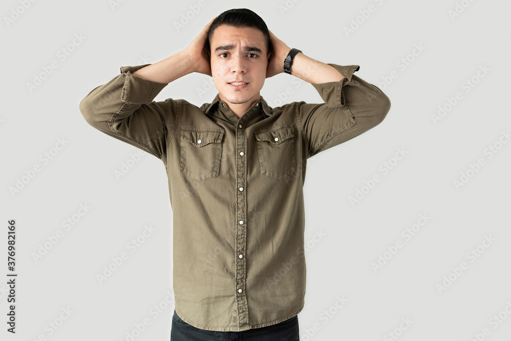 Guy in casual clothes looking stressed Guy in casual clothes looking stressed