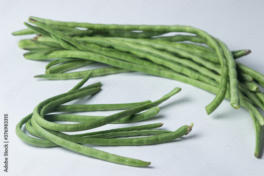 green beans on a white background. Harvesting. Home cooking
