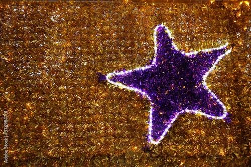 christmas background with star on golden background