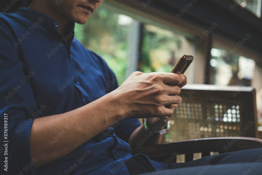 Close up of man using mobile phone. Close up of man using mobile phone.