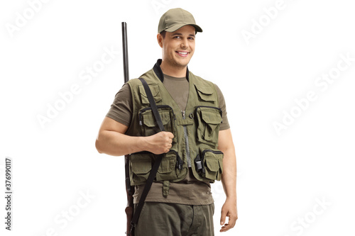 Man hunter with a shotgun on his shoulder