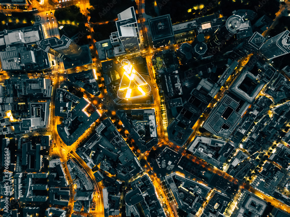 Circa June 2018: Aerial Overhead View of Frankfurt am Main, Germany Skyline at Night with glowing Streets Circa June 2018: Aerial Overhead View of Frankfurt am Main, Germany Skyline at Night with glowing Streets