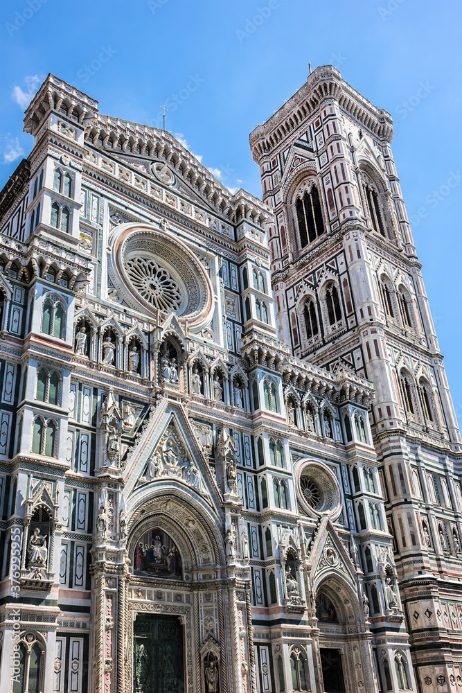 Eighty-five meter high tower Giotto's Campanile (designed in 1334 by Giotto di Bondone) - bell tower of the Basilica di Santa Maria del Fiore. Florence, Italy.