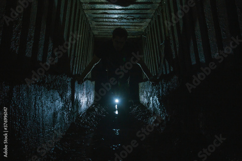  The guy in the underground tunnel inside old sewer shaft