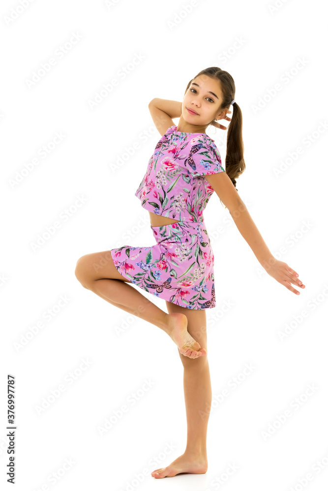Cheerful little girl in large shoes taken from her mother. Cheerful little girl in large shoes taken from her mother.