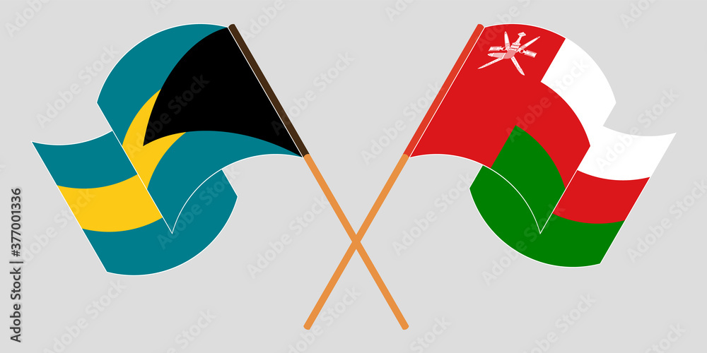 Crossed and waving flags of Bahamas and Oman Crossed and waving flags of Bahamas and Oman