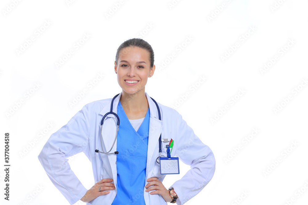 Beautiful young woman in white coat posing with hand in pocket. Woman doctor Beautiful young woman in white coat posing with hand in pocket. Woman doctor
