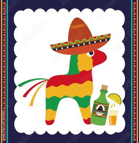 mexican independence day, pinata donkey with hat tequila bottle and lemon celebrated on september