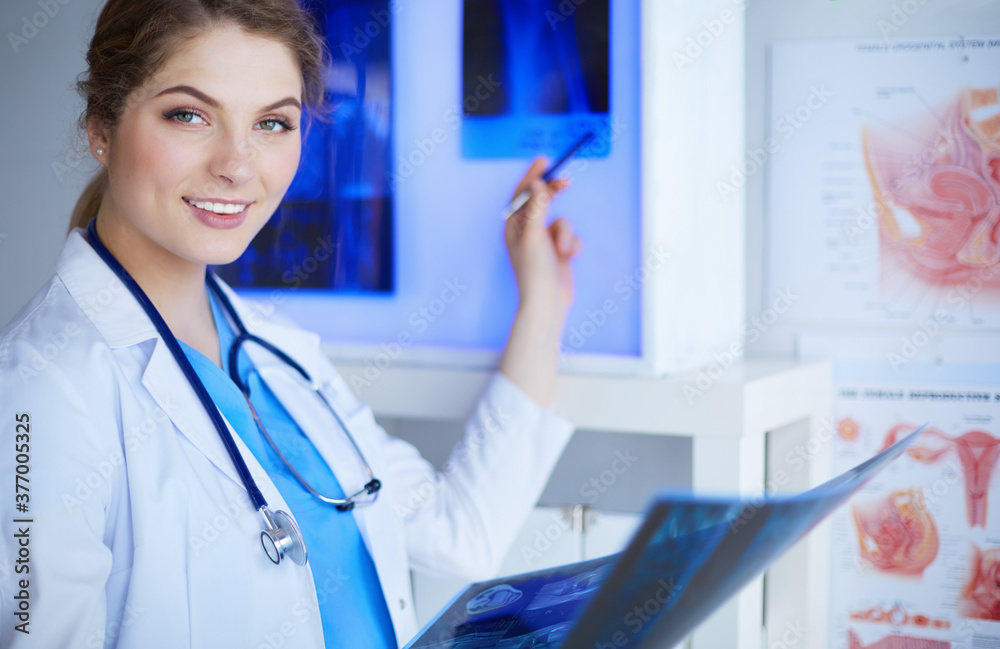 Young female doctor radiologist working in the clinic Young female doctor radiologist working in the clinic