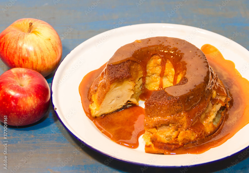 bread pudding made with stale bread, milk, eggs and sugar, decorated with liquid caramel and dulce de leche bread pudding made with stale bread, milk, eggs and sugar, decorated with liquid caramel and dulce de leche
