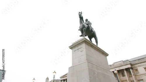 Lockdown in London, Gilmbal pan in Slow motion of King George IV Statue during coronavirus pandemic 2020.