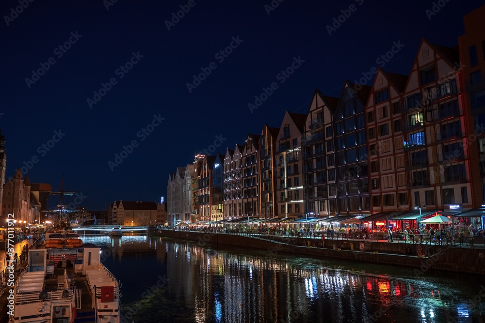 Gdansk, North Poland : Night photograph of medieval style polish architecture over motlawa river