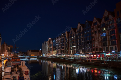 Gdansk  North Poland   Night photograph of medieval style polish architecture over motlawa river