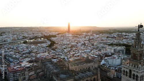 Seville, Andalucia, Spain - drone shot of the cityscape while sunset.