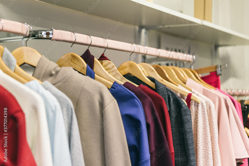 Fashion stylish luxury clothes display. Image and stylish services, selection of colors, types. Capsule fall wardrobe