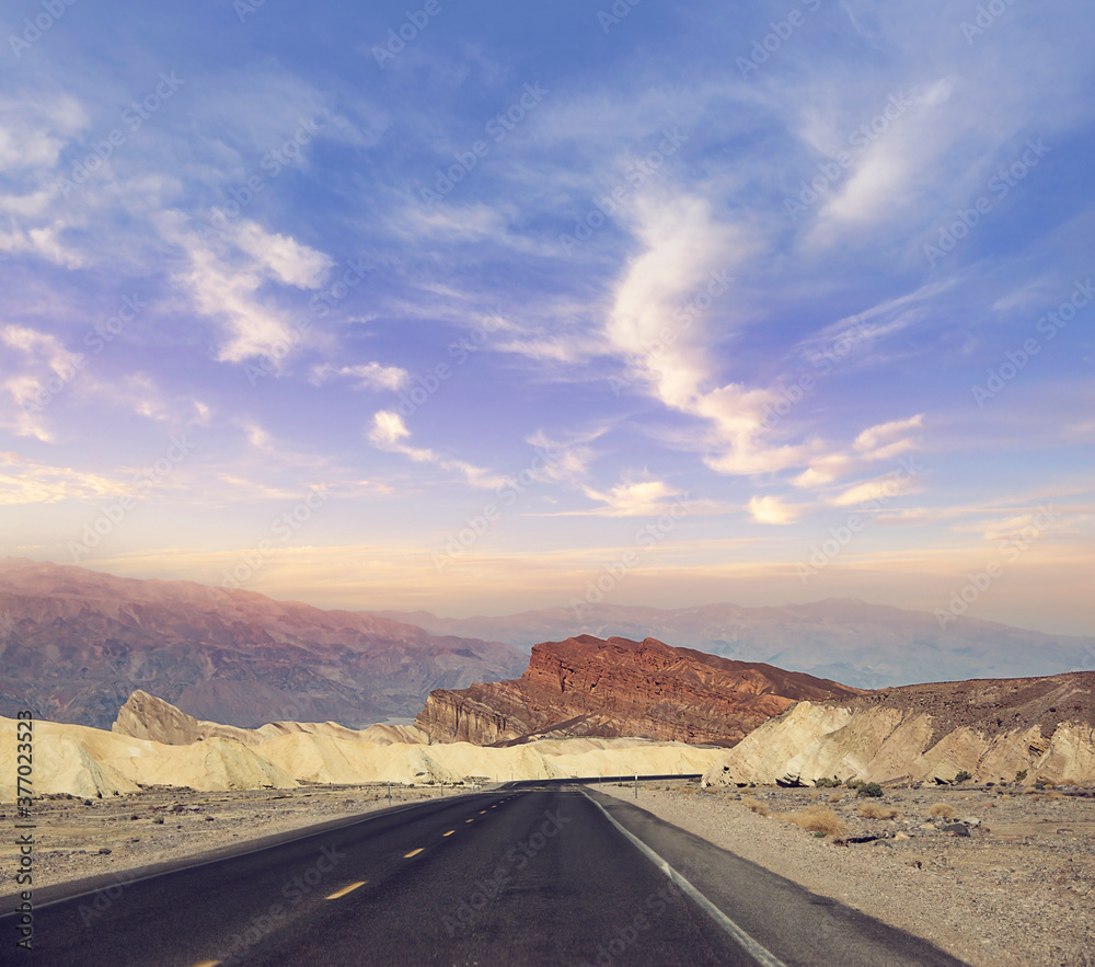 Desert road leading through Death Valley National Park, California USA. Desert road leading through Death Valley National Park, California USA.