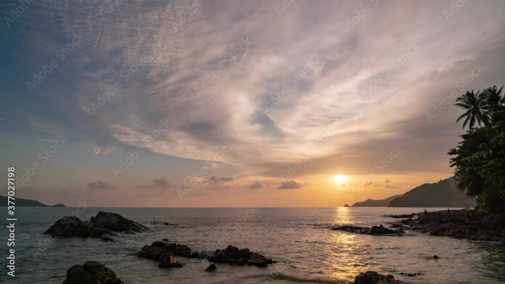 4K Timelapse of Amazing dramatic sunrise sky or sunset sky and clouds flowing over tropical sea Beautiful light nature in the sky 4K Timelapse of Amazing dramatic sunrise sky or sunset sky and clouds flowing over tropical sea Beautiful light nature in the sky