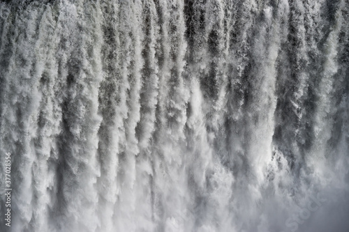 Closeup of water falling on Dettifoss waterfall in Iceland.