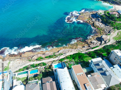 Panoramic Aerial Drone View of Bondi Beach Sydney NSW Australia houses on the cliff
